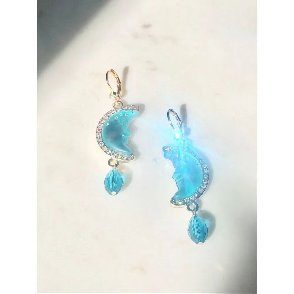 Iridescent bright blue moon dangle earrings